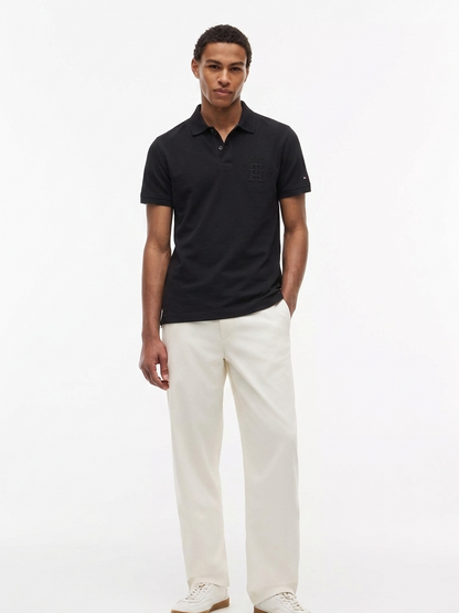 Tommy Hilfiger Embossed Monotype Logo Polo – Black
