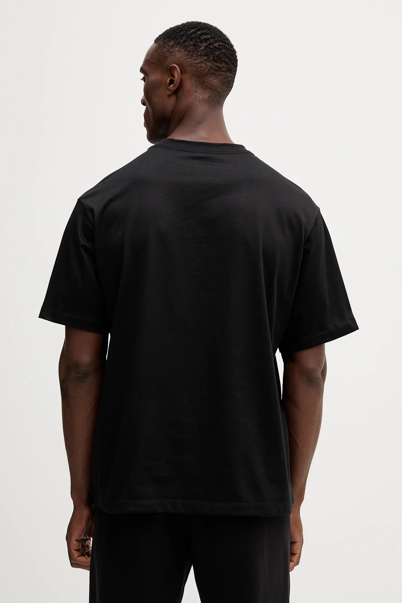 Calvin Klein Relaxed Monogram Logo T-Shirt – Black